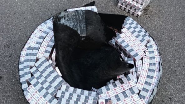 Pasieniečiai sulaikė per Nemuną automobilio padangoje plukdytas kontrabandines cigaretes